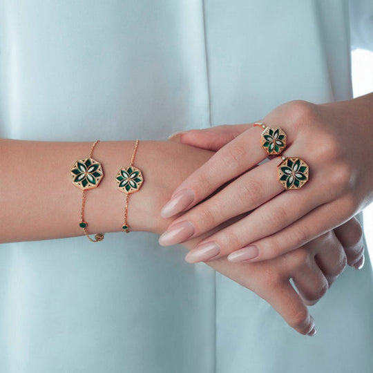 A model's hands displaying the Samra Ward Turath Small Ring on her hands