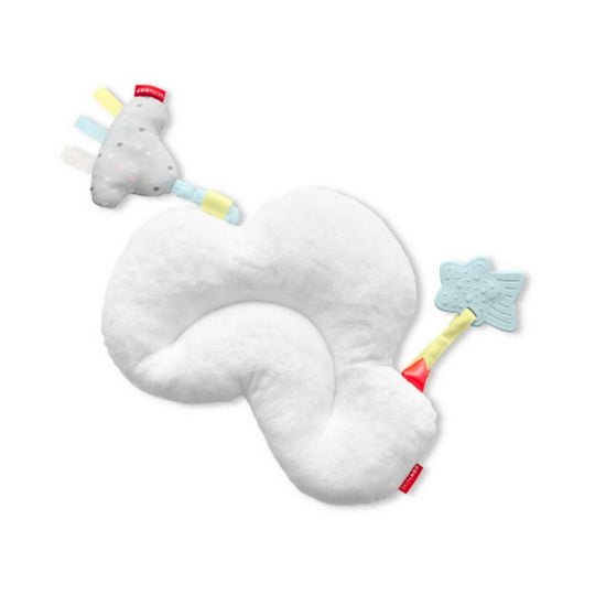 White baby neck pillow with colorful toys on a white background