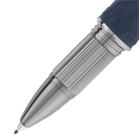 Close-up of the tip of a Montblanc Starwalker SpaceBlue fineliner pen, showing the metal tip, ridged barrel, and blue textured section.