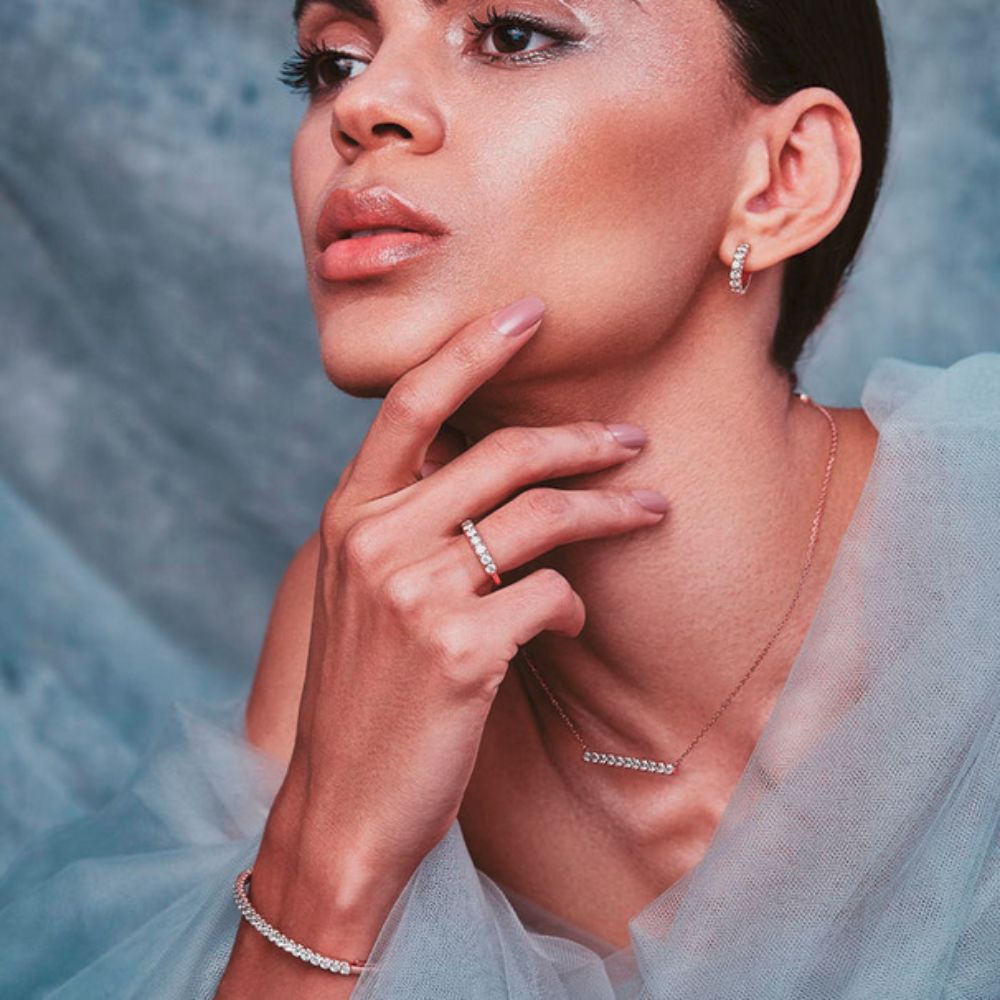 A model wearing Samra Thalj Rose Gold Diamond Necklace