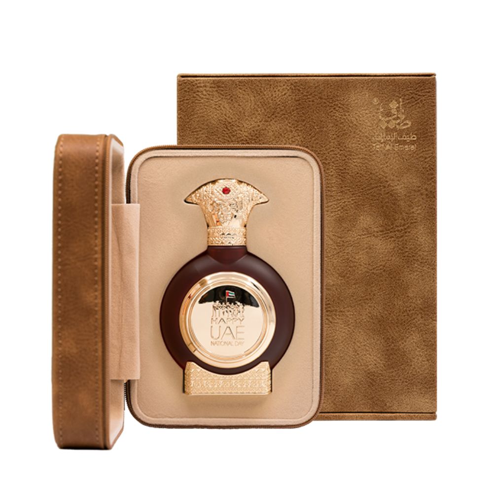 An EDP 75mL bottle of UAE National Day perfume by Taif Al Emarat in its open Leather box
