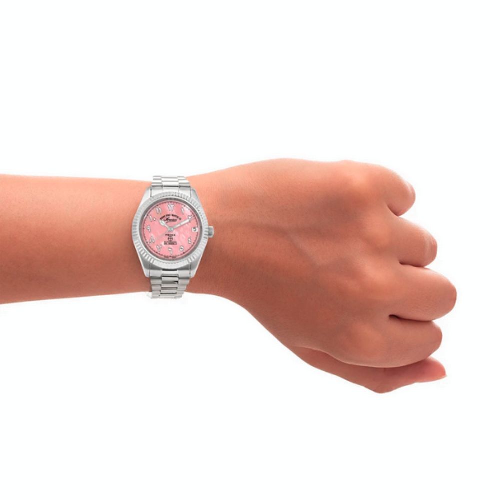 A close-up studio shot of a women's West End watch. The watch has a silver-tone case and bracelet. The dial is a vibrant pink mother-of-pearl with a subtle shimmer.  The watch features traditional watch hands and hour markers. It is photographed on a clean white background.