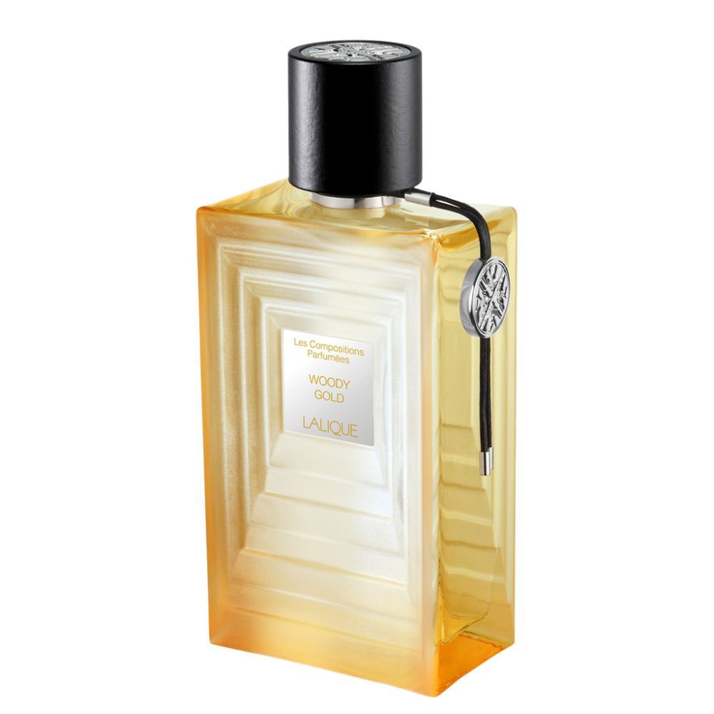 An EDP 100mL bottle of Woody Gold by Lalique