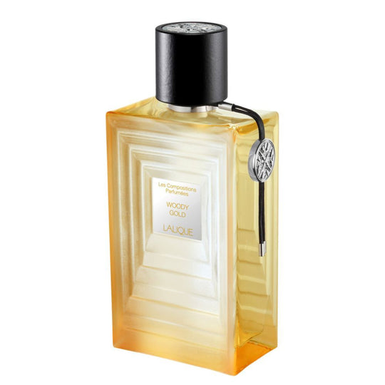 An EDP 100mL bottle of Woody Gold by Lalique