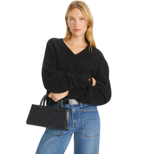 Model Holding Top Handle of T Monogram Rectangular Tote