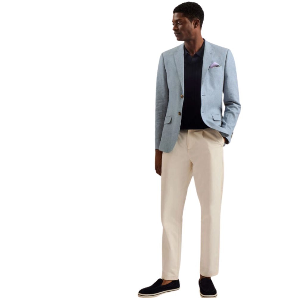 Model in Light Blue Linen Blend Cotton Blazer and White Pant