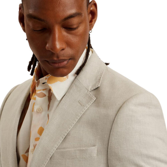 Man in Beige Linen Blend Cotton Blazer with Floral Shirt