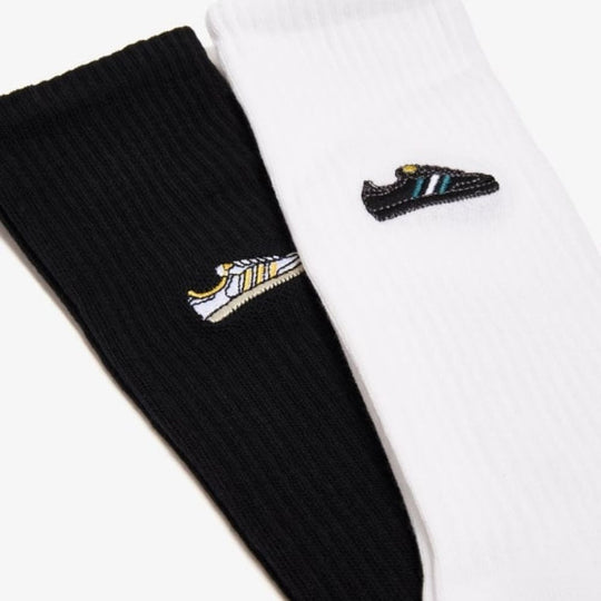 Adidas Samba Crew Socks 2-pack: Black and white socks with a tiny embroidered Samba shoe on one each sock.