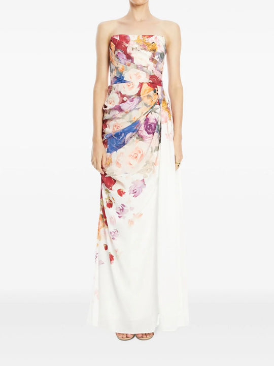 Model wearing the white bustier dress with cascading flowers