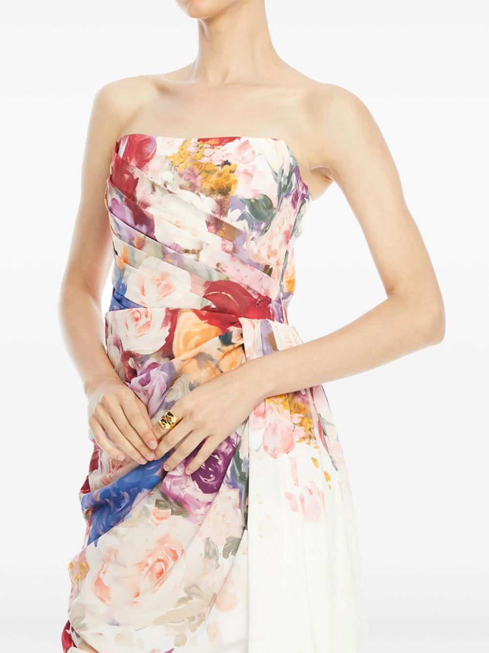 Close up of the floral neatly pleated bustier of the colorful floral gown