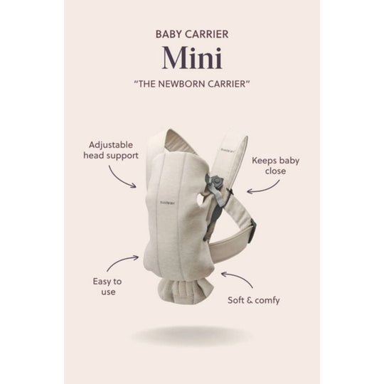 Baby carrier with features highlighted on a beige background