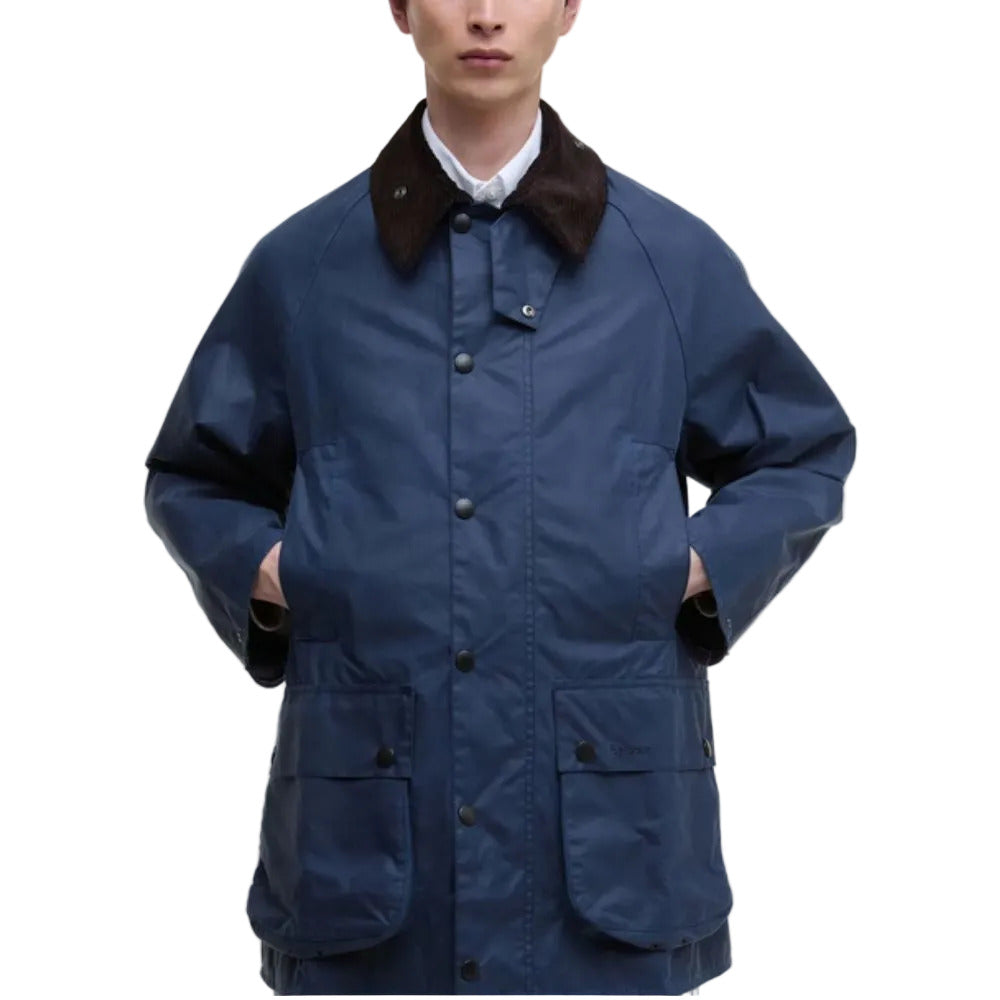 Person wearing a blue jacket with a brown collar on a white background