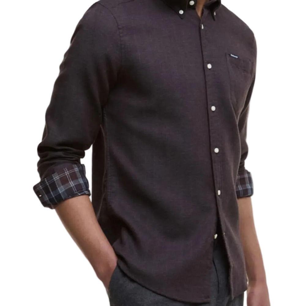 Dark brown button-up shirt with plaid cuffs on a white background