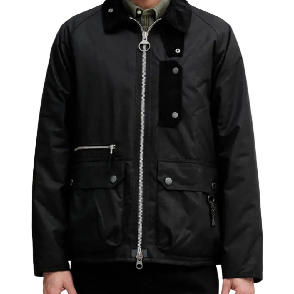 Black jacket with zippers and buttons on a white background