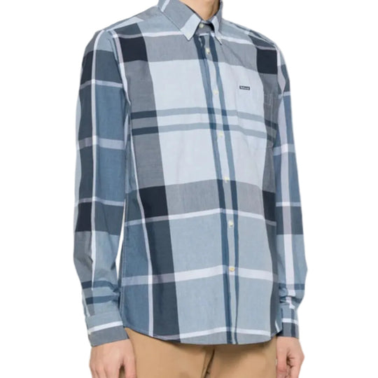 Blue and gray plaid shirt worn by a person on a white background