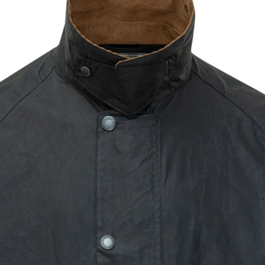 Close-up of a dark jacket with a brown lining on a white background