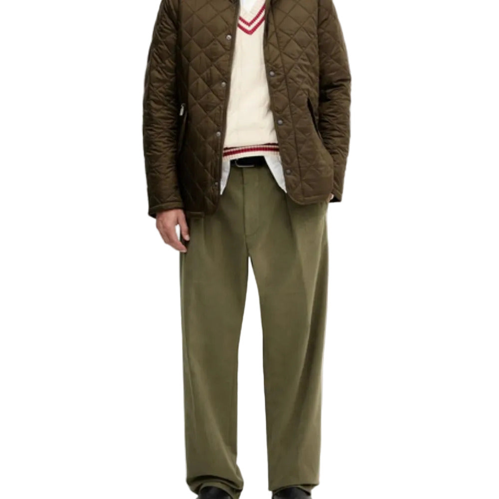 A model wearing BARBOUR Slim Flyweight Chelsea Jacket With Snap-Fasten Pockets And Tonal Branding