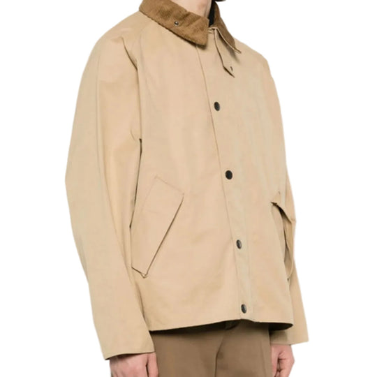 Beige jacket with brown collar on a white background