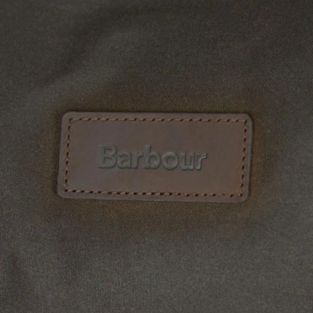 Barbour logo on a textured fabric background