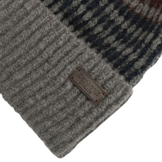 Gray knit beanie with a brand label on a white background