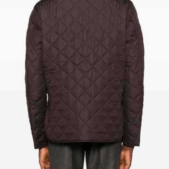 Quilted jacket with diamond pattern on a white background