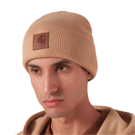 A model wearing Carhartt WIP Eldon Soft Acrylic Ribbed Knit Brown Workwear Beanie