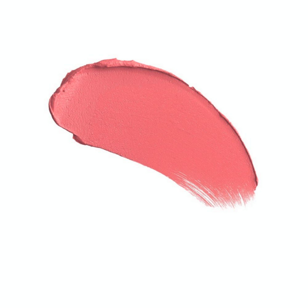 A swatch of Charlotte Tilbury Matte Revolution Lipstick in a pinkish-nude shade, showcasing its creamy texture