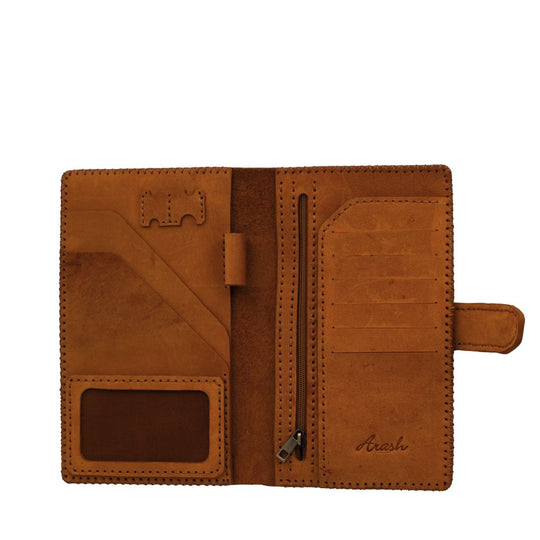 Brown leather wallet with visible brand name on a white background