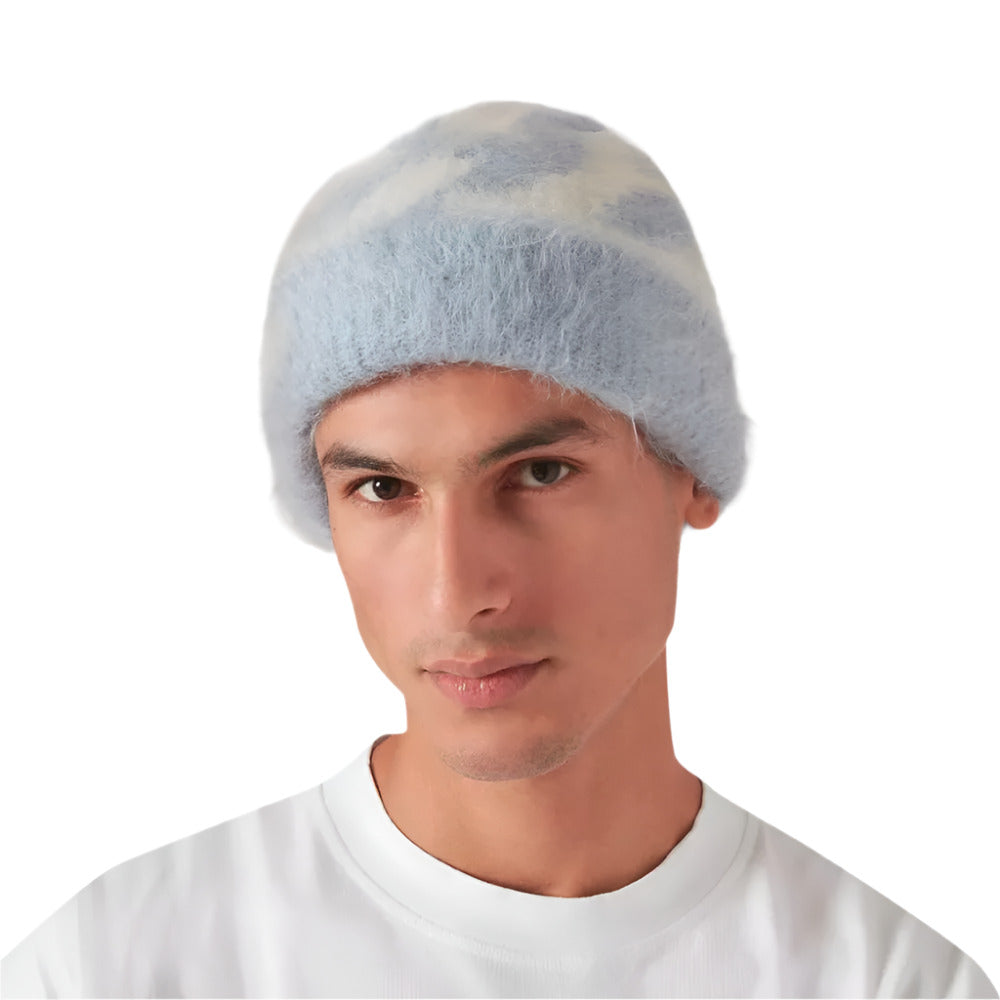 A model wearing Cole Buxton Luxurious Hand-Brushed Alpaca Blue Beanie with CB Logo