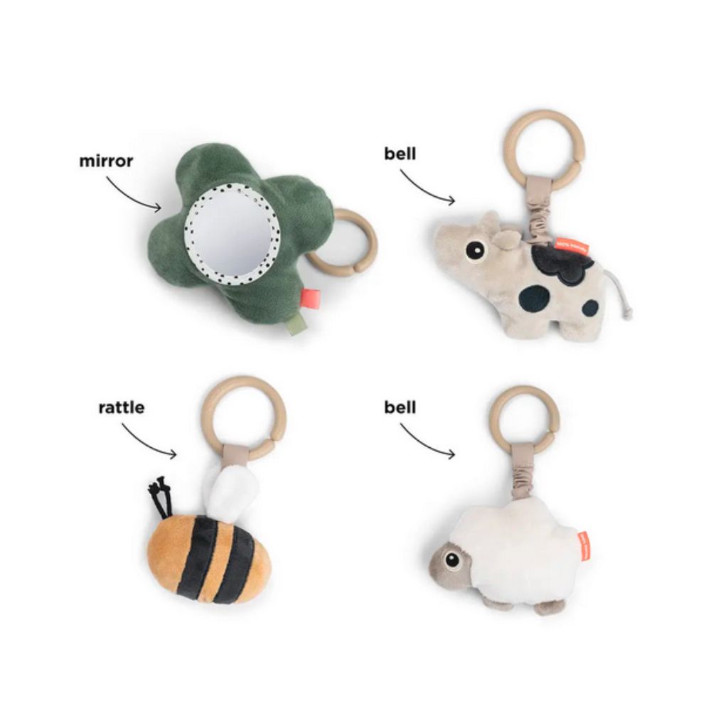 Four plush toys with labels for mirror, bell, rattle, and bell on a white background
