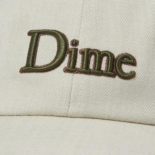 A close up shot of the Logo Embroidery on Dime Classic Wool Blend Ivory Grey Low Pro Cap