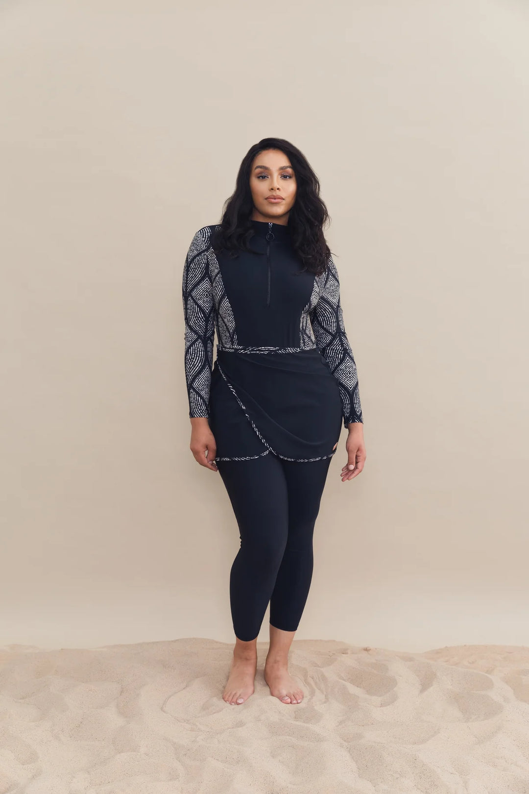 Sofia aztec printed navy blue swimsuit on a plus size body