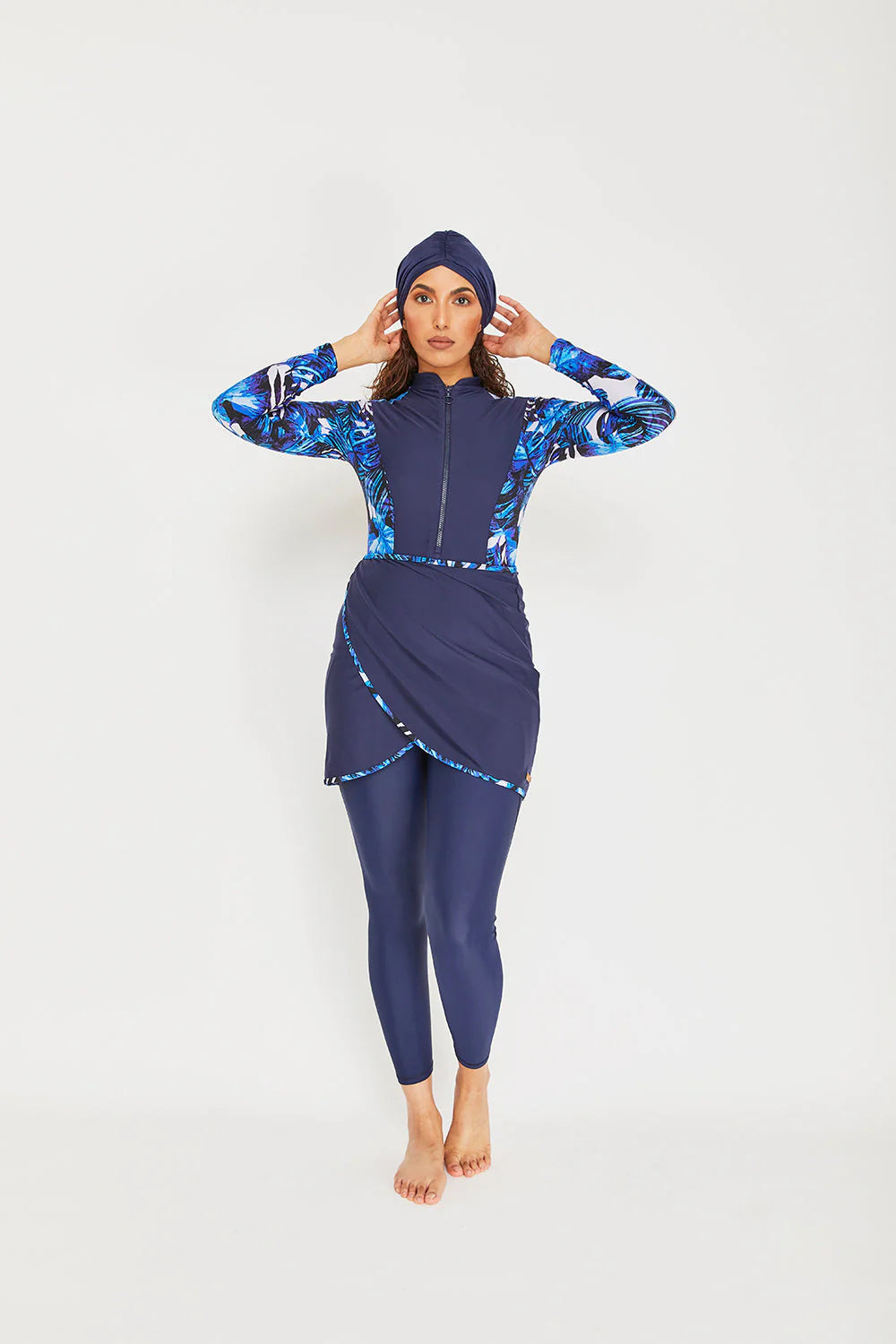 Model wearing sofia forest print in shades of blue with leggings and turban 