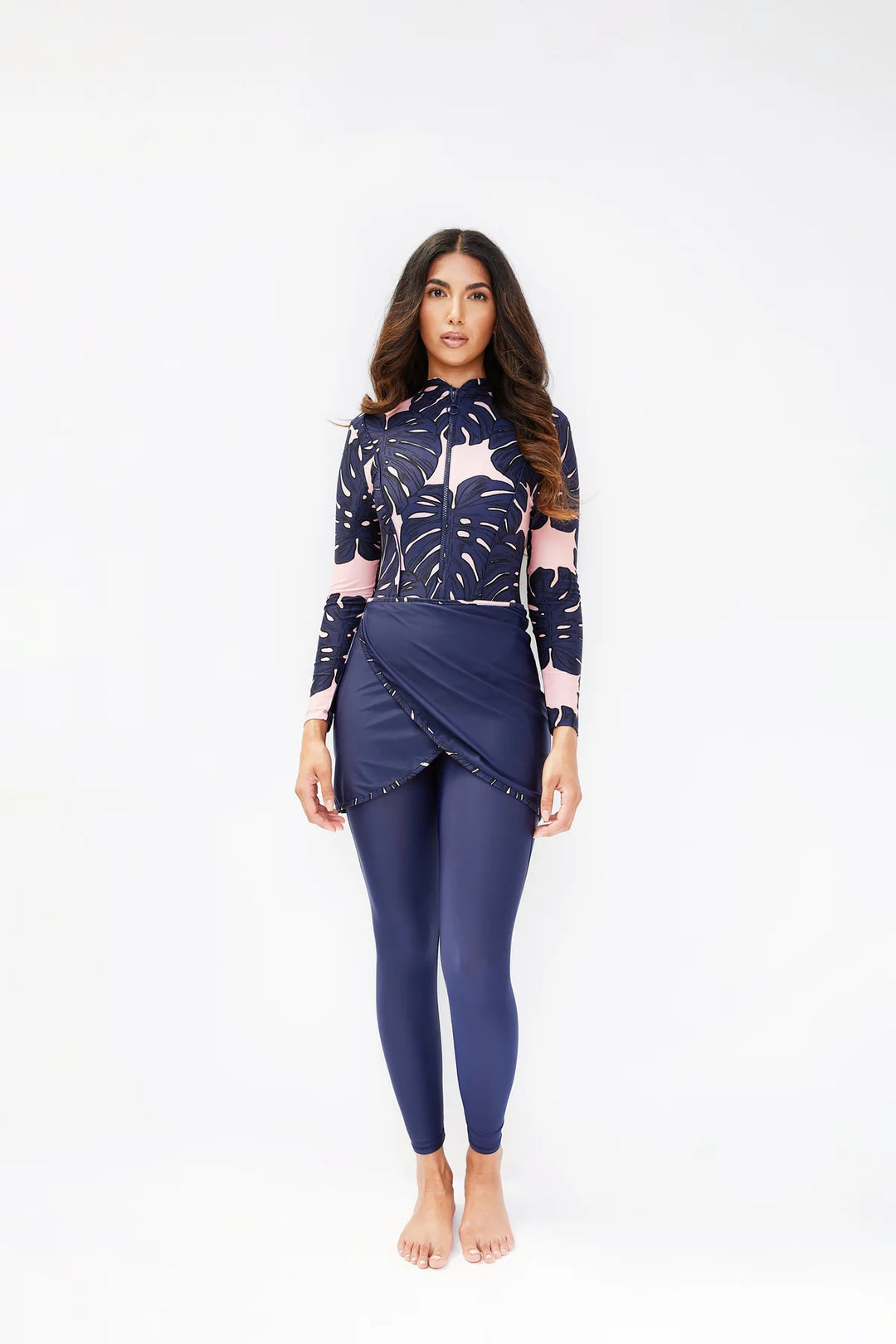 Model wearing sofia palm print in navy blue and pink