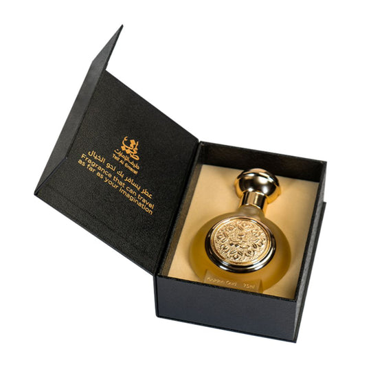 An EDP 75mL bottle of Golden Oud by Taif Al Emarat in its open Box