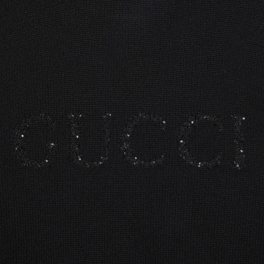 Close up view of the sequinned Gucci intarsia 