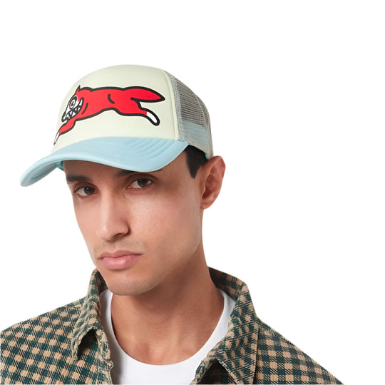A model wearing Ice Cream Running Dog Design Trucker Cap - Light Blue & Off White