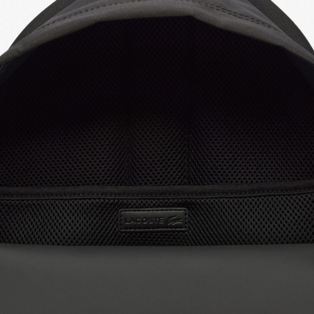 Close up of opening of LACOSTE Neocroc Black Backpack