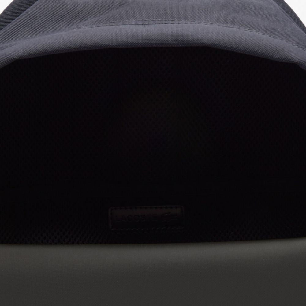 Close up of opening of LACOSTE Neocroc Blue Backpack