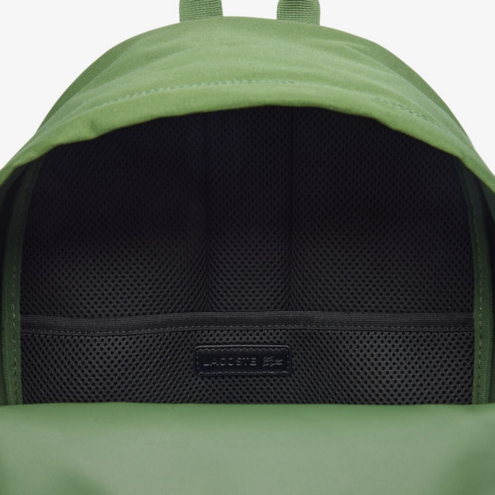 Close up of LACOSTE Neocroc Green Backpack opening
