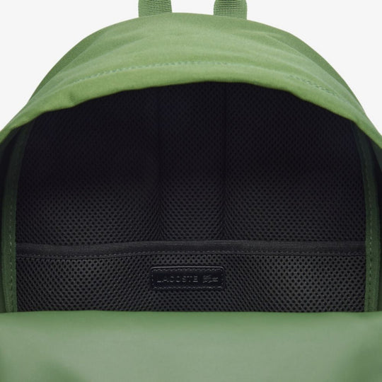 Close up of LACOSTE Neocroc Green Backpack opening