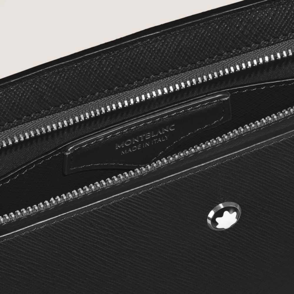 Close-up of a black leather bag with Montblanc branding and logo.