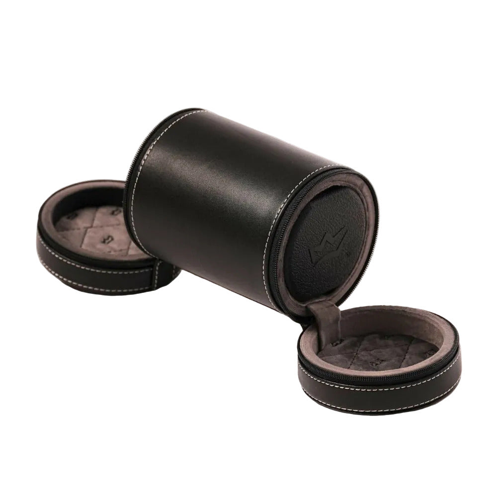 Black leather cylindrical jewelry box with gray interior on a white background