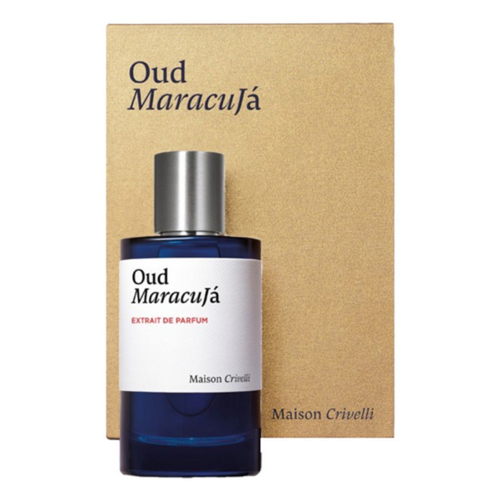 Blue perfume bottle with silver cap and 'Oud Maracuja' label against a beige background