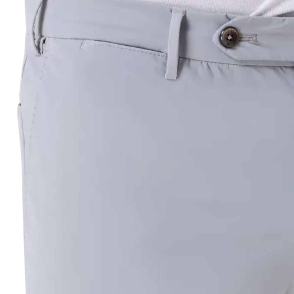 A close-up of a man's grey PT TORINO Slim Flannel Trousers with a buttoned waistband