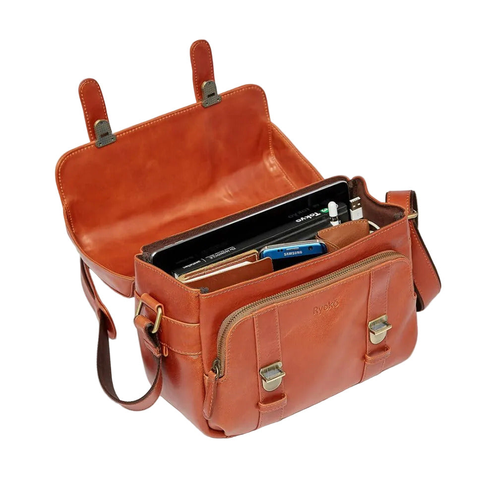 Brown leather bag with compartments on a white background