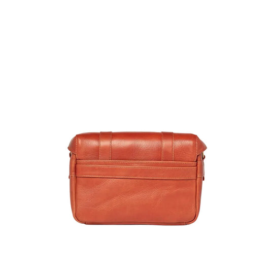 Brown leather bag on a white background