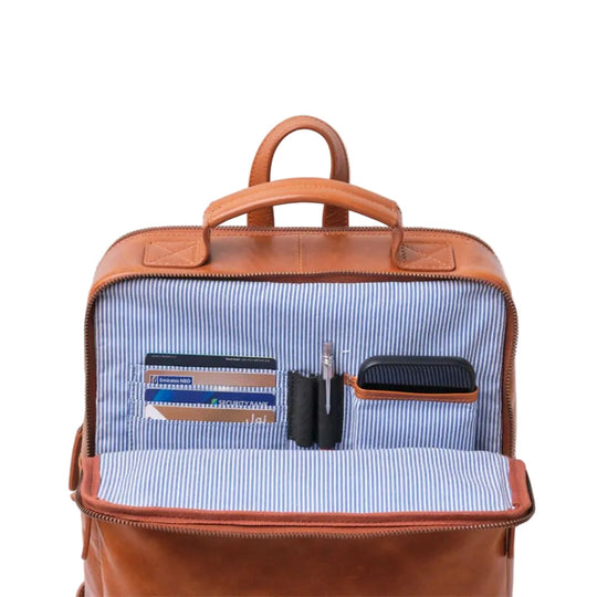 Brown leather backpack with blue interior showing organized compartments.