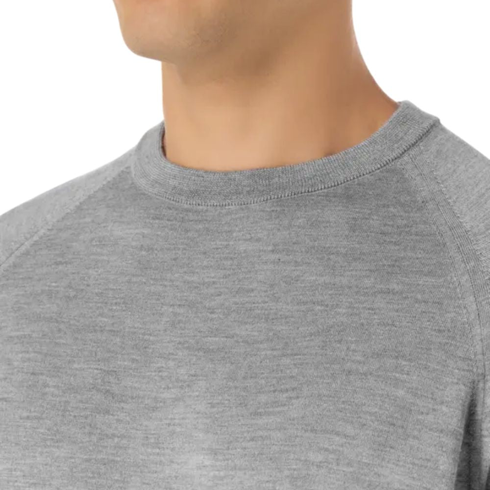 Close up shot of the neckline of SEASE Short Sleeve Knitted T-Shirt worn by a male model