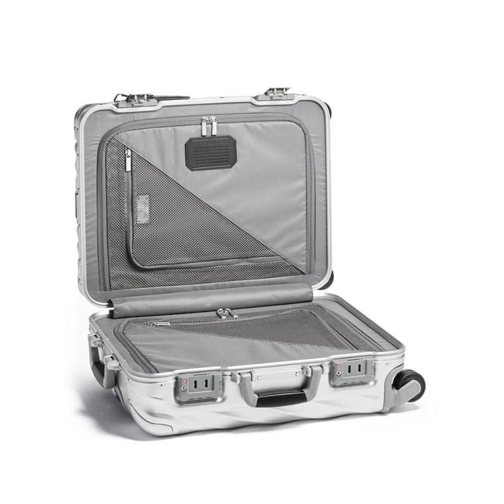 Silver suitcase with open lid on a white background
